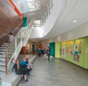 CannonDesign chose vinyl tiles that look like stone in Leslie Shankman School Corp.’s Hyde Park Day School’s circulation spaces.