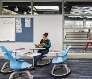 Marine Science Magnet High School worked with JCJ architecture to create variety and interest between spaces using contrasting carpet tile patterns throughout. 