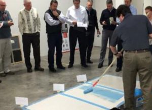 Schönox gave Herregan distributors a demo of its self-leveling products, touting easy installation and reduced air quality issues as two differentiators.
